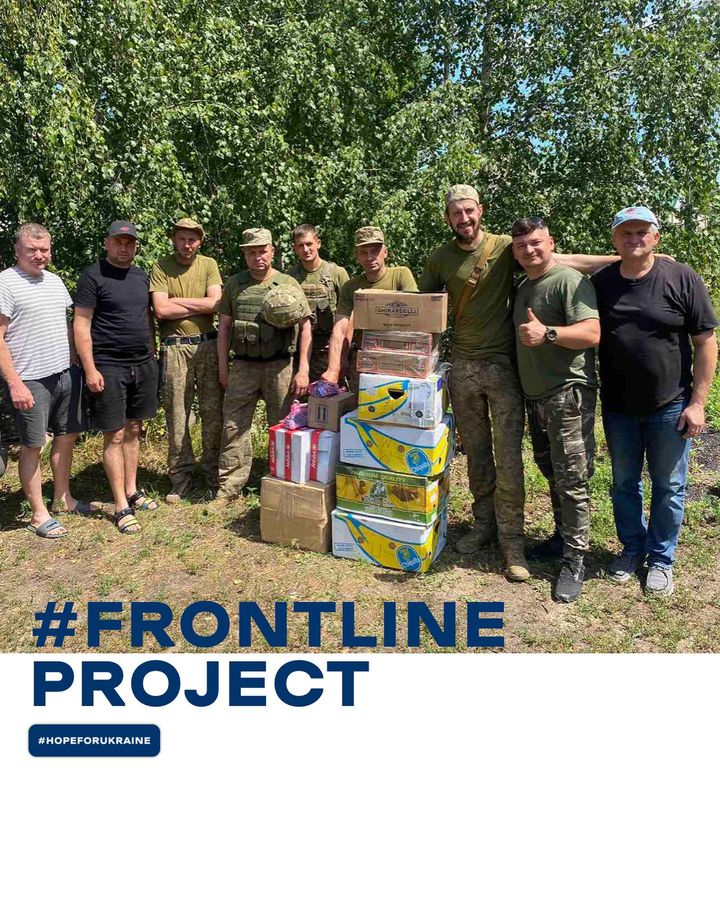 a group of men posing for a photo with the words frontline project.