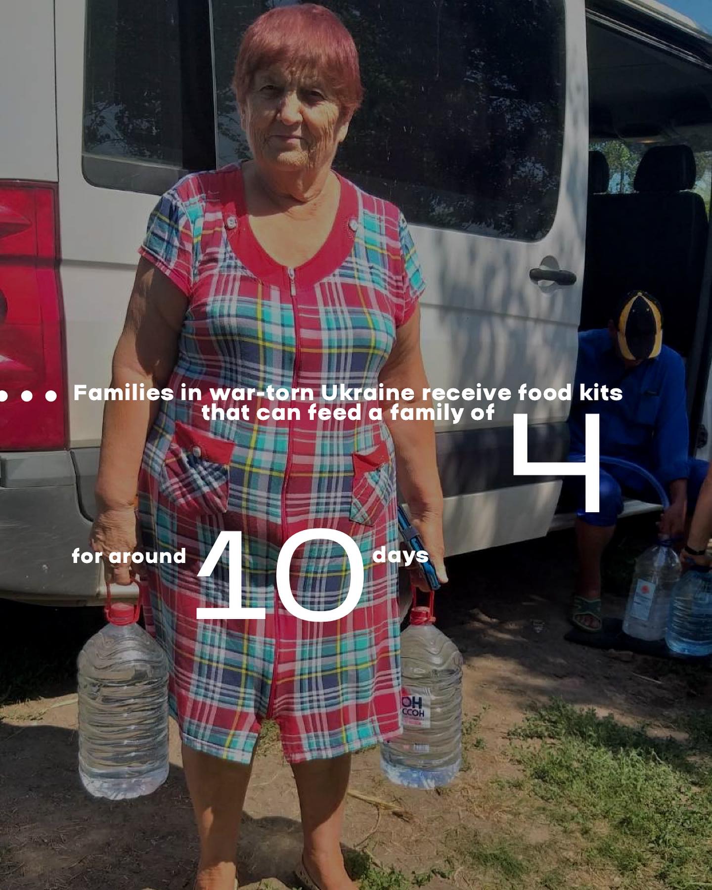 A woman is standing in front of a van with water bottles.