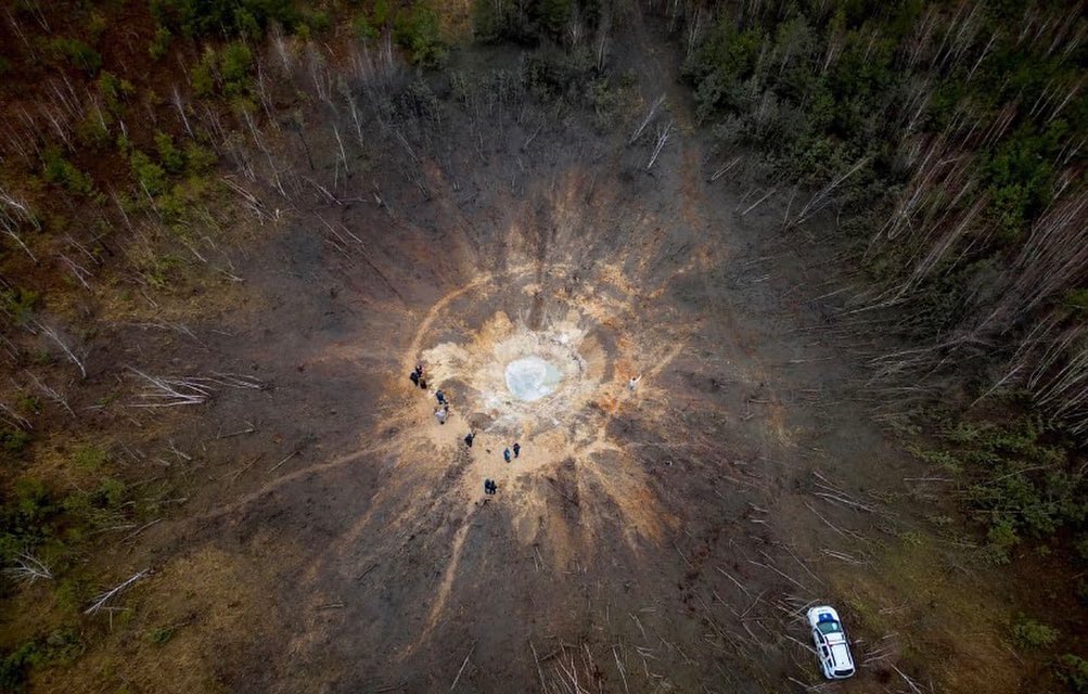 An aerial view of a hole in the ground.