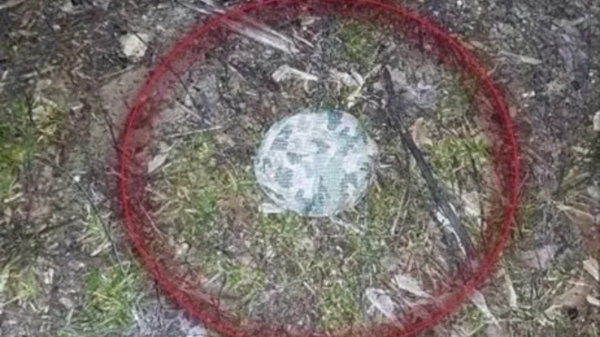 Putin luring kids with toy-like ‘gingerbread mines Toy-like landmine on a street in Ukraine posing danger to civilians, including children.