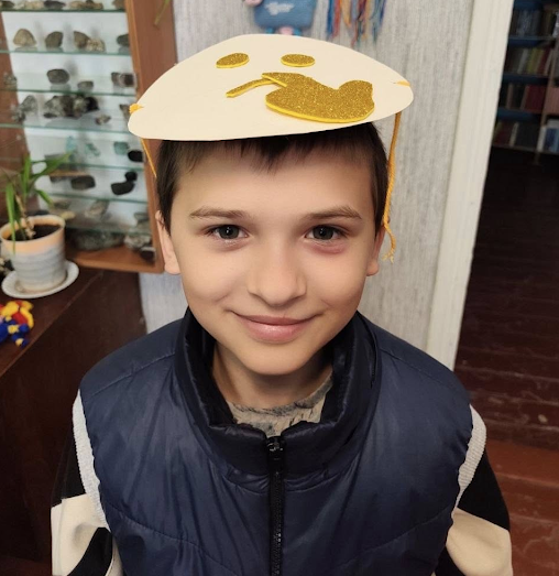 young ukrainian boy in the hope for ukraine afterschool program smiling